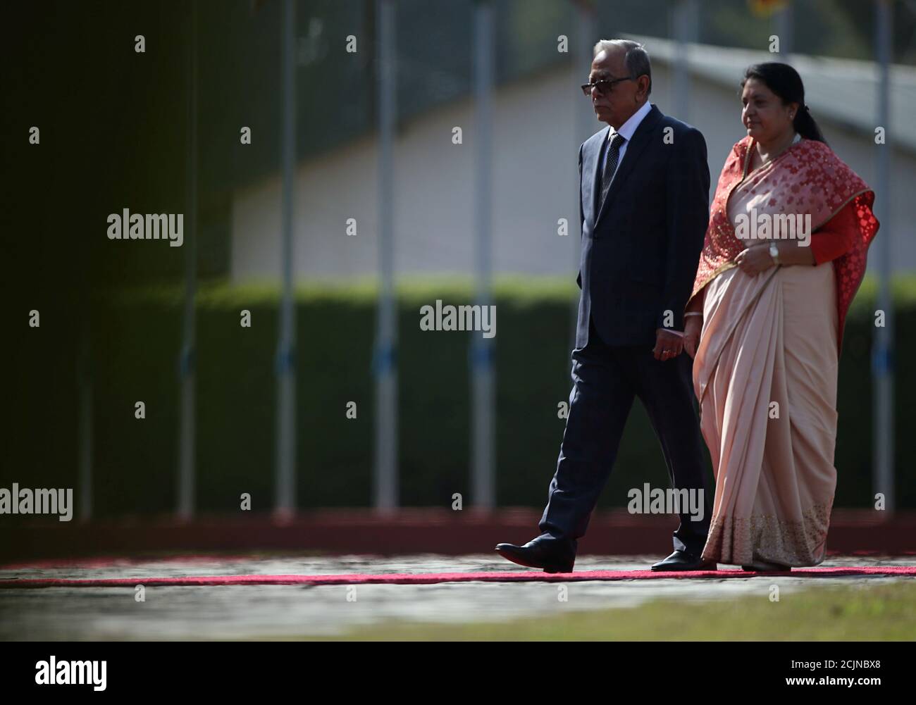 Bangladeshi President Abdul Hamid walks along with Nepal's President Bidhya Devi Bhandari to inspect the guard of honour upon his arrival at Tribhuvan International Airport in Kathmandu, Nepal November 12, 2019. REUTERS/Navesh Chitrakar/Pool Stock Photo