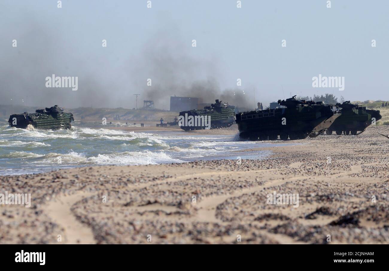 U.S. navy amphibious assault vehicles land during annual recurring multinational, maritime-focused NATO exercise BALTOPS 2017, near Ventspils, Latvia, June 6, 2017. REUTERS/Ints Kalnins Stock Photo