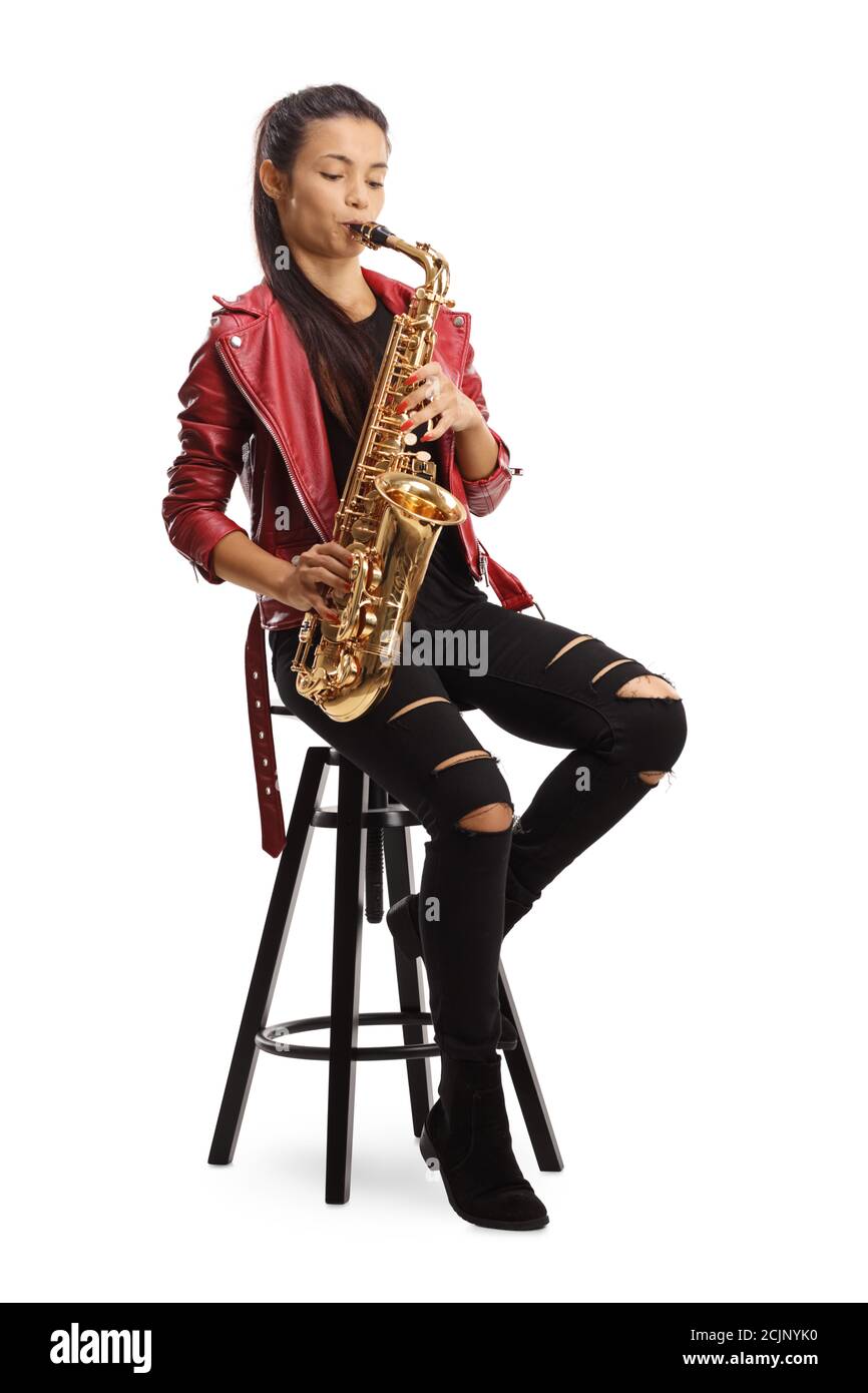 Full length portrait of a female saxophonist in a red leather jacket  playing sax while sitting on a chair isolated on white background Stock  Photo - Alamy
