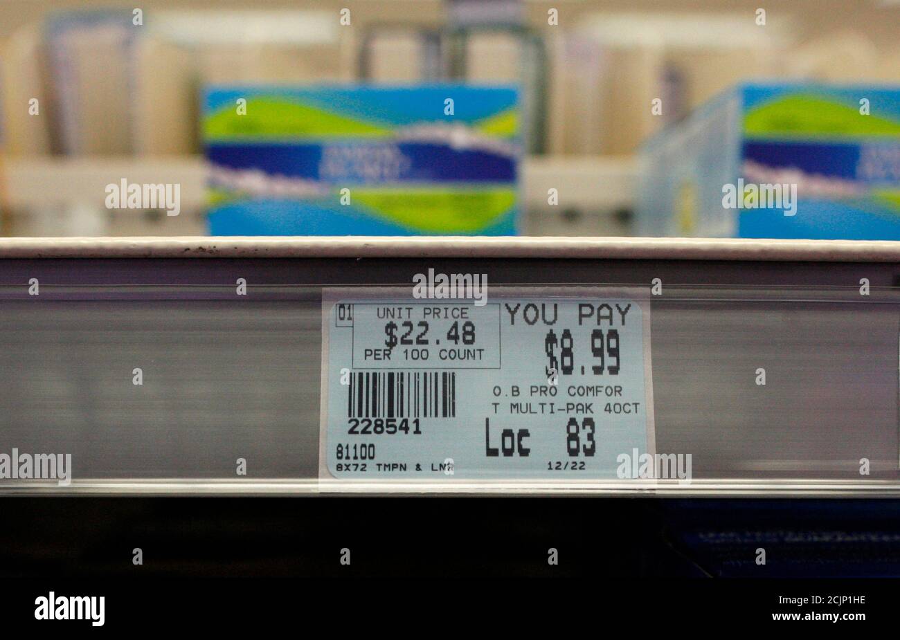 A price tag for o.b. tampons is seen below a shelf where they are normally  sold at a store in New York, January 19, 2011. Johnson & Johnson, already  under fire for