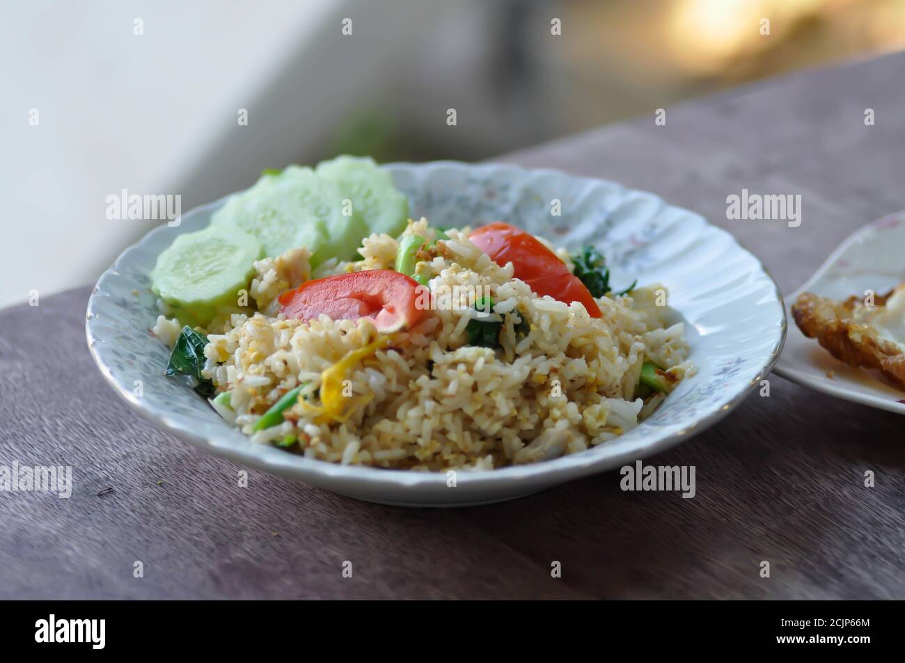 fried rice or stir-fried rice with vegetable Stock Photo - Alamy