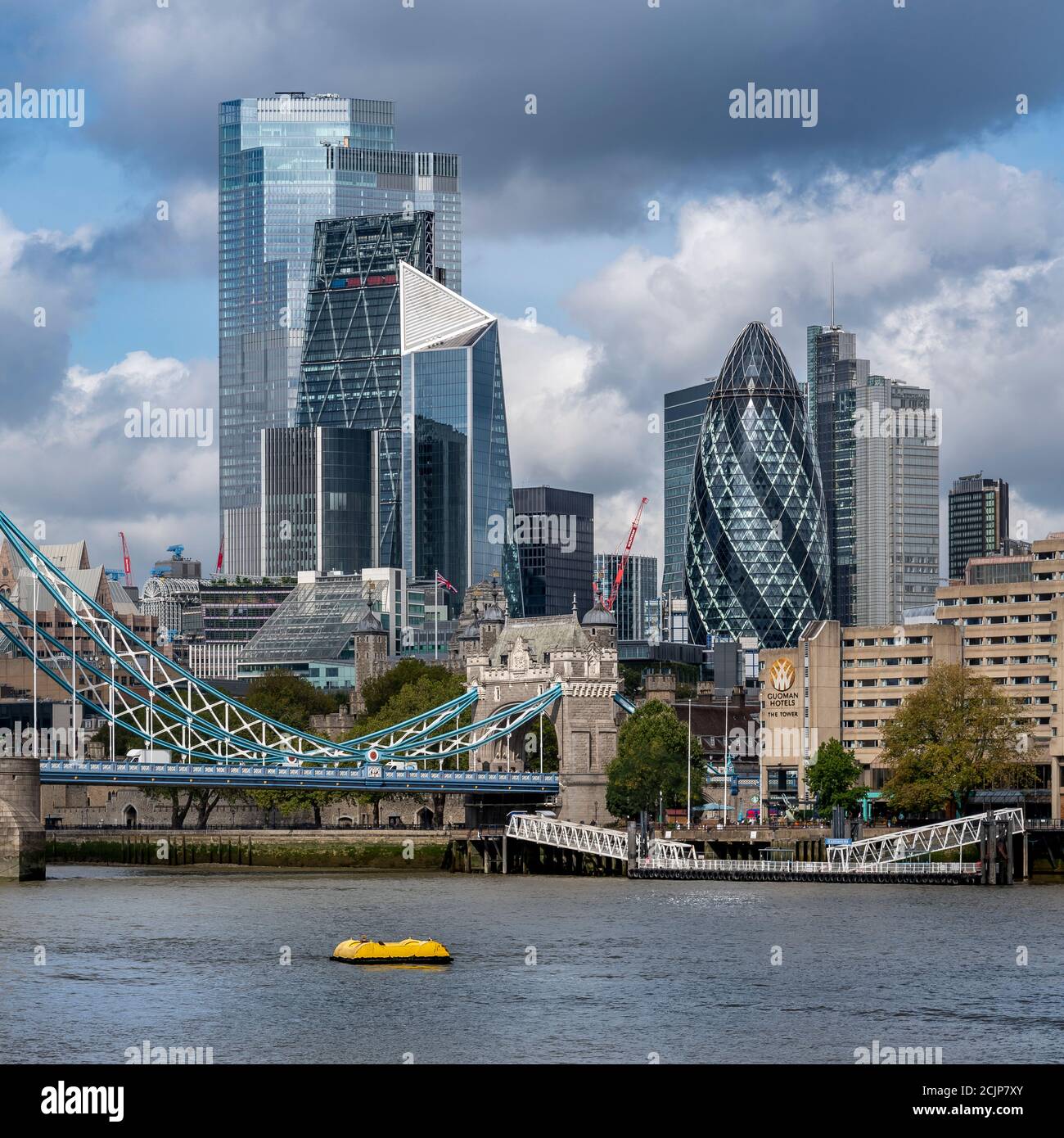 London cityscape, shot from Butler's Wharf. Skyscrapers shown are The Cheesegrater, The Scalpel, The Gherkin and the new tallest one called Twentytwo. Stock Photo