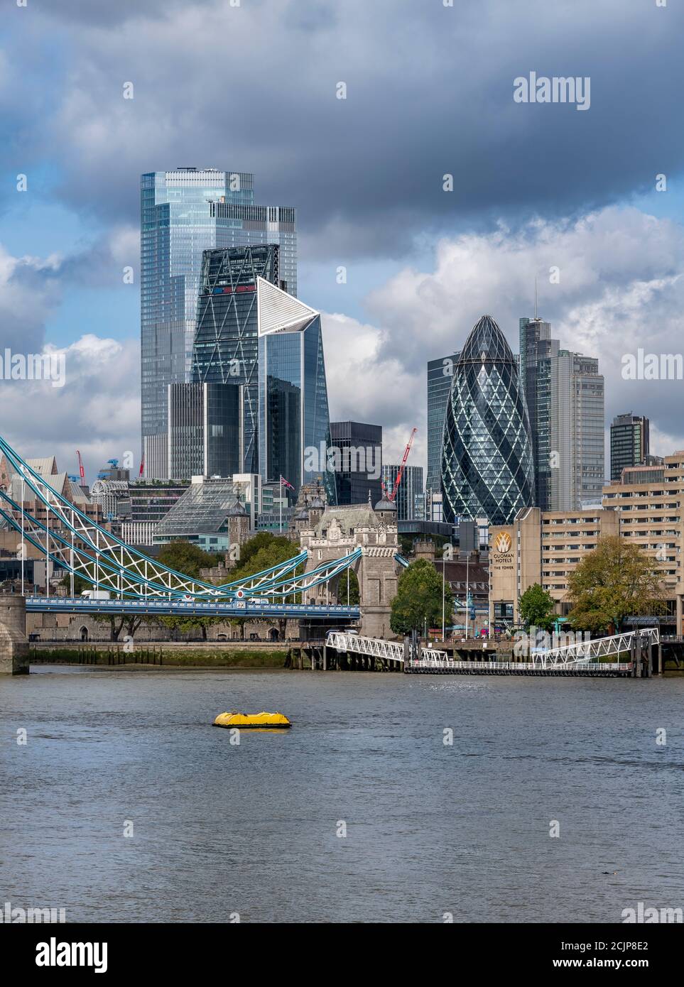 London cityscape, shot from Butler's Wharf. Skyscrapers shown are The Cheesegrater, The Scalpel, The Gherkin and the new tallest one called Twentytwo. Stock Photo