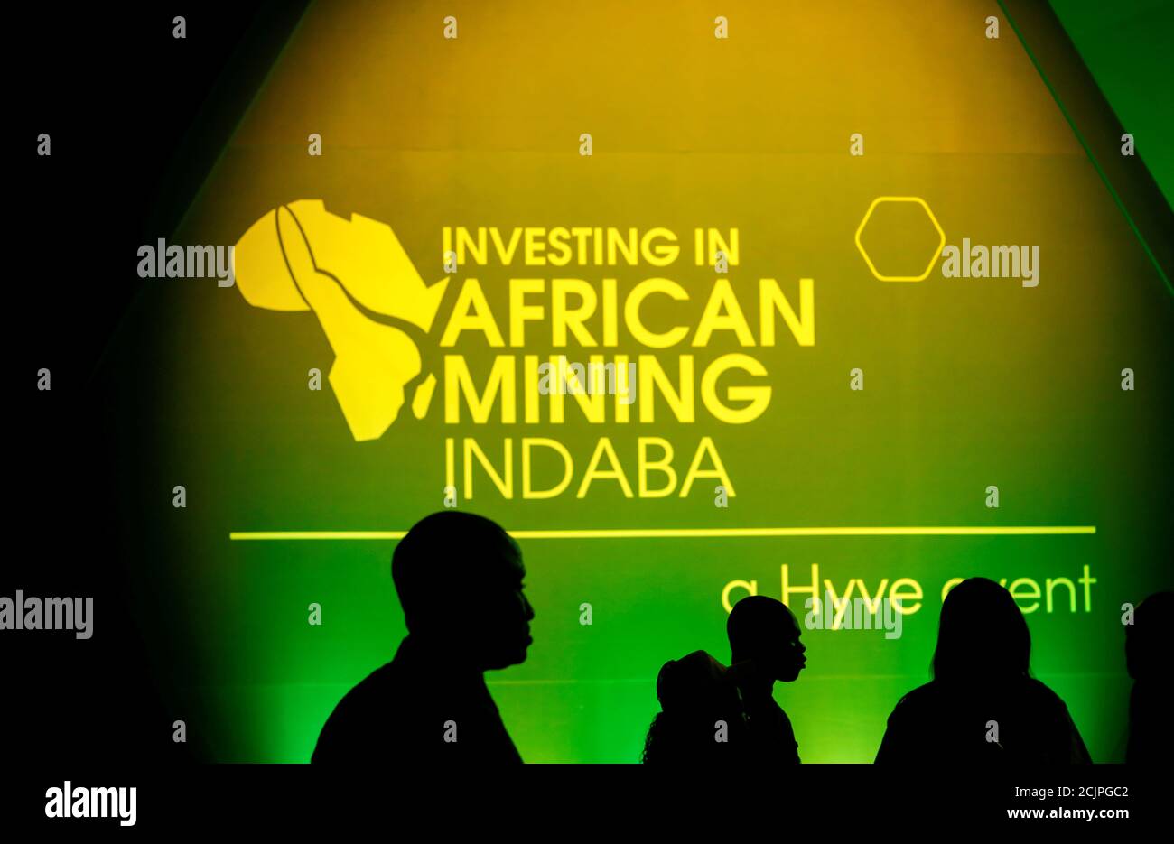 Delegates walk past signage at the 2020 Investing in African Mining Indaba  conference in Cape Town, South Africa, February 3, 2020. REUTERS/Mike  Hutchings TPX IMAGES OF THE DAY Stock Photo - Alamy