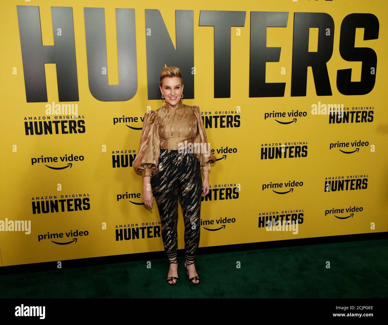 Cast member Kate Mulvany poses at a premiere for the television series