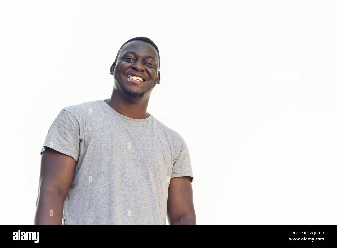 Man smiling isolated african hi-res stock photography and images - Alamy