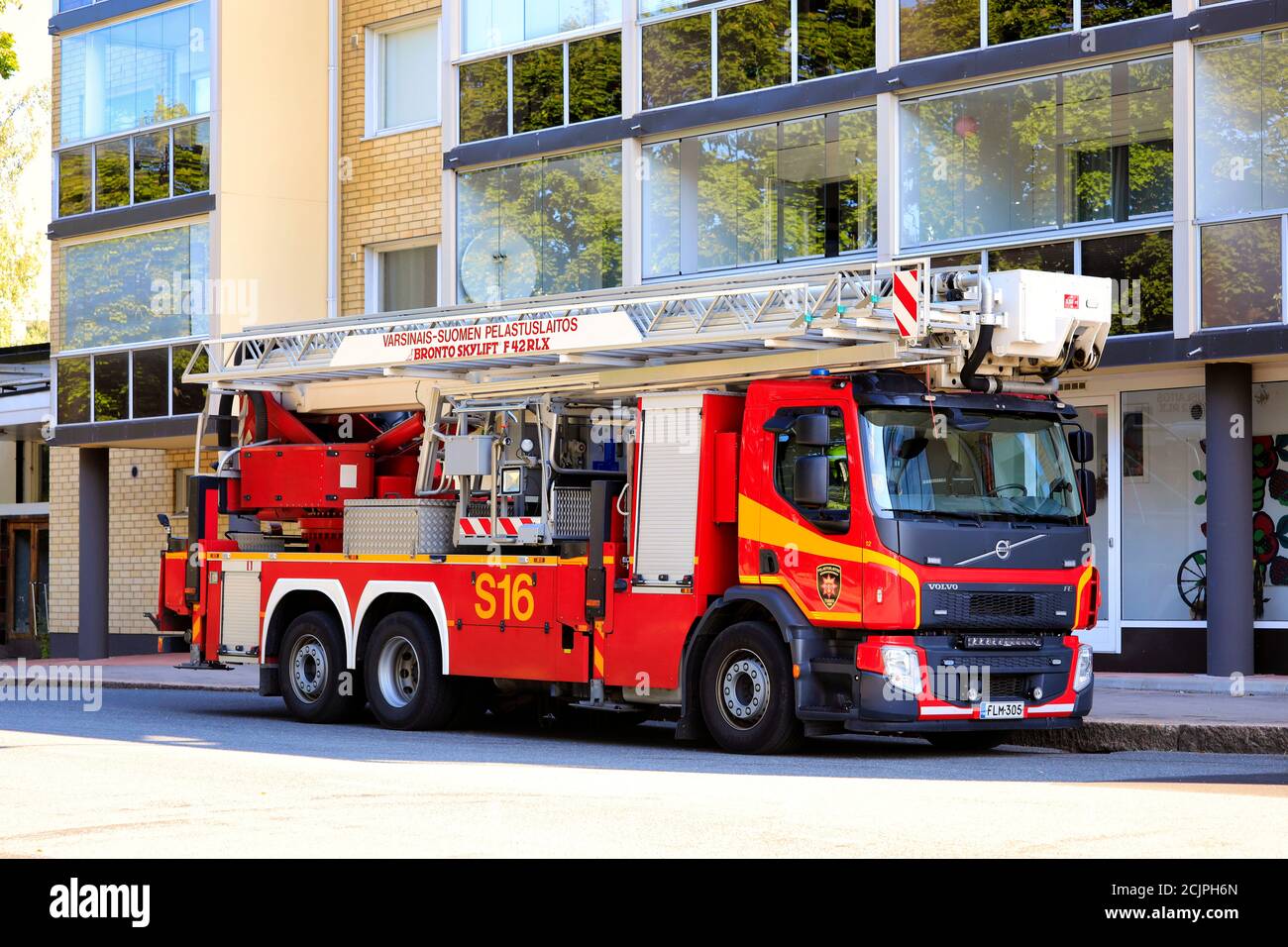 Volvo FE fire truck with Bronto F42RLX Skylift aerial ladder platform parked on city street. Salo, Finland. August 16, 2020. Stock Photo