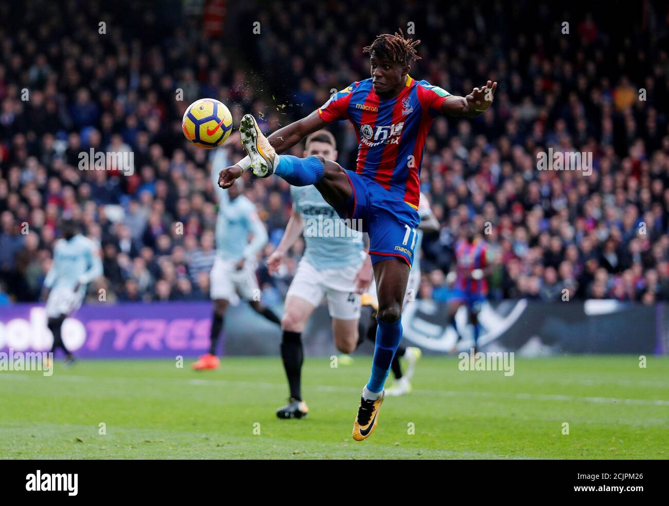 Soccer Football - Premier League - Crystal Palace vs West Ham United - Selhurst Park, London, Britain - October 28, 2017   Crystal Palace's Wilfried Zaha in action   REUTERS/Eddie Keogh    EDITORIAL USE ONLY. No use with unauthorized audio, video, data, fixture lists, club/league logos or 'live' services. Online in-match use limited to 75 images, no video emulation. No use in betting, games or single club/league/player publications. Please contact your account representative for further details.? Stock Photo