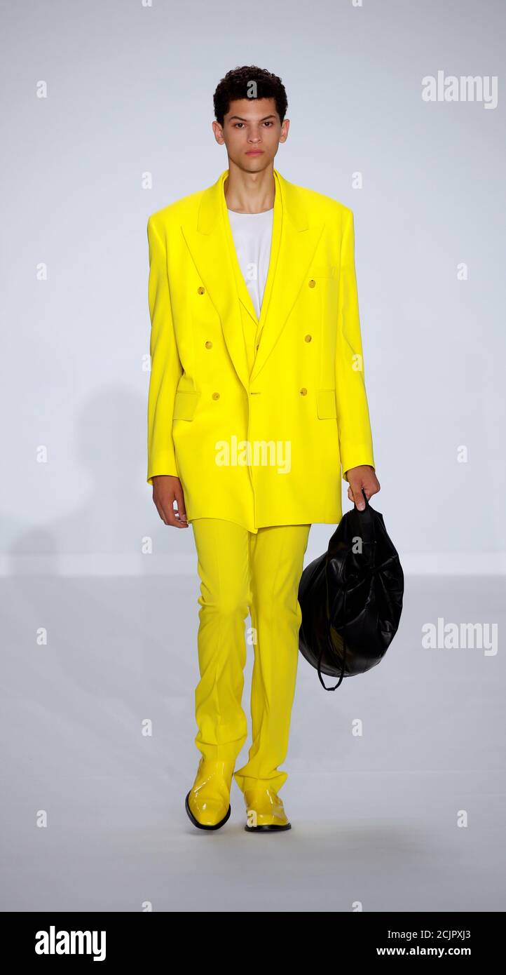 A model presents a creation by designer Sir Paul Smith as part of his  Spring/Summer
