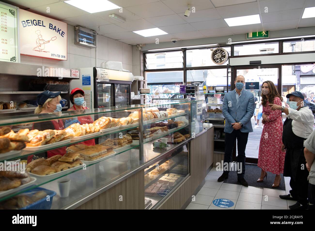 The Duke and Duchess of Cambridge during a visit to the Beigel Bake