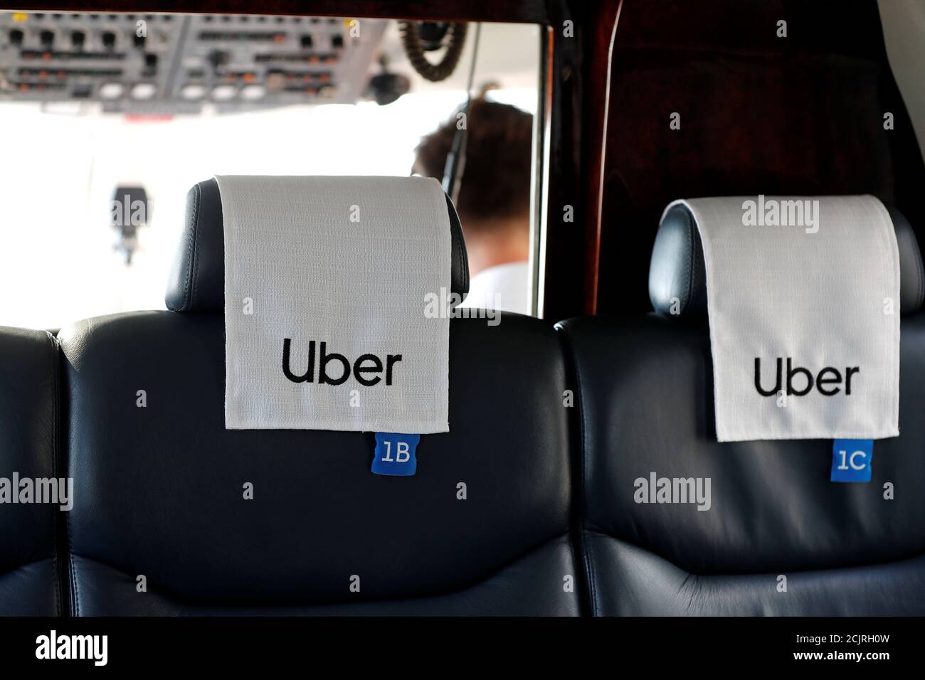 Seats with Uber logos are seen inside a helicopter operated by 