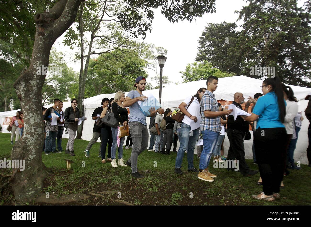 Job Seekers Submit Curriculum Vitae During A Job Fair At National Park In San Jose Costa Rica September 24 2015 Approximately 7 000 People Visited The Fair For 1 500 Positions Available According To