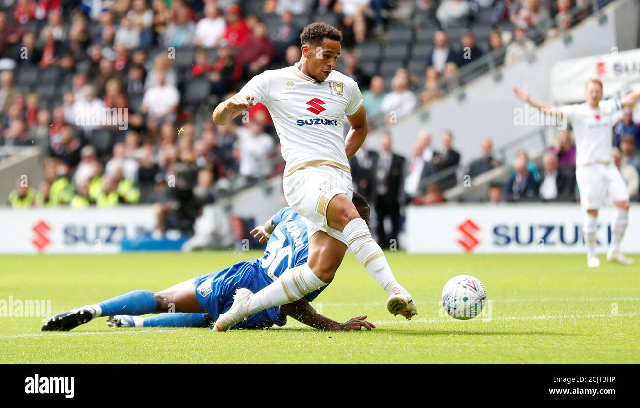 Soccer Football - League One - Milton Keynes Dons v AFC Wimbledon - Stadium MK, Milton Keynes, Britain - September 7, 2019   MK Dons' Sam Nombe scores their first goal   Action Images/Peter Cziborra    EDITORIAL USE ONLY. No use with unauthorized audio, video, data, fixture lists, club/league logos or 'live' services. Online in-match use limited to 75 images, no video emulation. No use in betting, games or single club/league/player publications.  Please contact your account representative for further details. Stock Photo