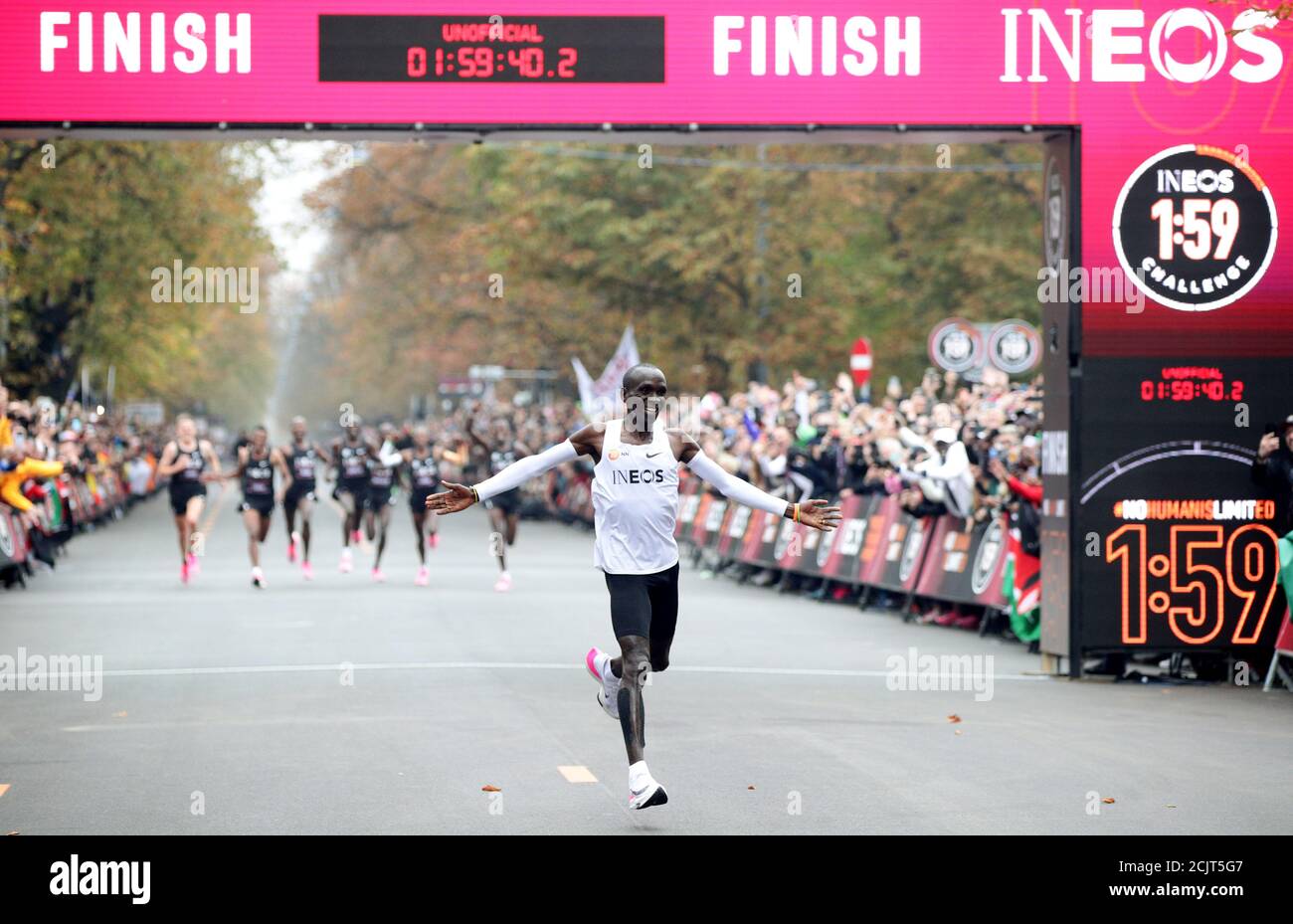 Kenya's Eliud Kipchoge, the marathon world record holder, crosses the  finish line during his attempt to