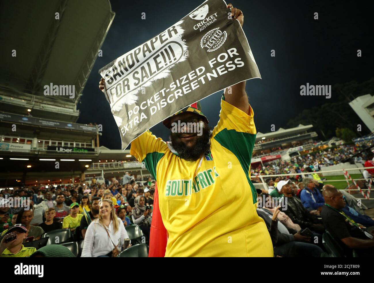 Cricket - South Africa v Australia - First T20 -  Imperial Wanderers Stadium, Johannesburg, South Africa - February 21, 2020   A South Africa fan poses with a banner during the match   Action Images via Reuters/Mike Hutchings     TPX IMAGES OF THE DAY Stock Photo