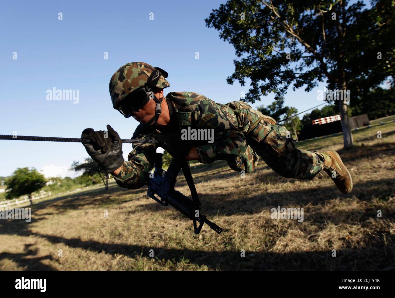 A Mexican Marine Slides Down A Zipline During Training At A Military Base In Chetumal November 16 12 Mexico S New President Has Vowed Repeatedly To Demilitarize The Campaign Against Drug Cartels But