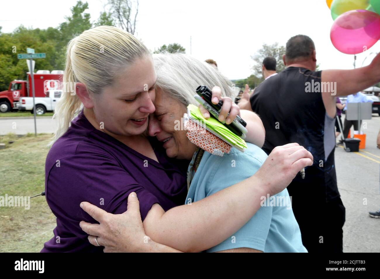 Protestors and family members embrace after hearing the news of Governor  Mary Fallin issuing a stay for death row inmate Richard Glossip outside the  Oklahoma State Penitentiary in McAlester, Oklahoma, September 30,