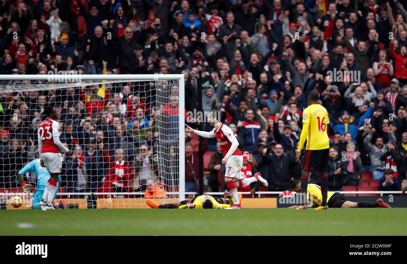 Soccer Football - Premier League - Arsenal vs Watford - Emirates Stadium, London, Britain - March 11, 2018   Arsenal's Henrikh Mkhitaryan celebrates scoring their third goal     REUTERS/Eddie Keogh    EDITORIAL USE ONLY. No use with unauthorized audio, video, data, fixture lists, club/league logos or 'live' services. Online in-match use limited to 75 images, no video emulation. No use in betting, games or single club/league/player publications.  Please contact your account representative for further details. Stock Photo