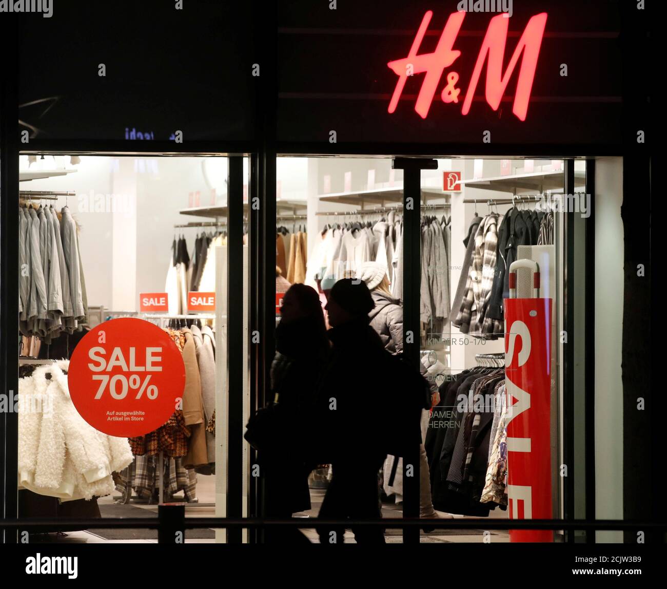 Sale discounts up to 70 percent are offered on a display window of a H&M  store in Zurich, Switzerland January 7, 2019. Picture taken January 7,  2019. REUTERS/Arnd Wiegmann Stock Photo - Alamy
