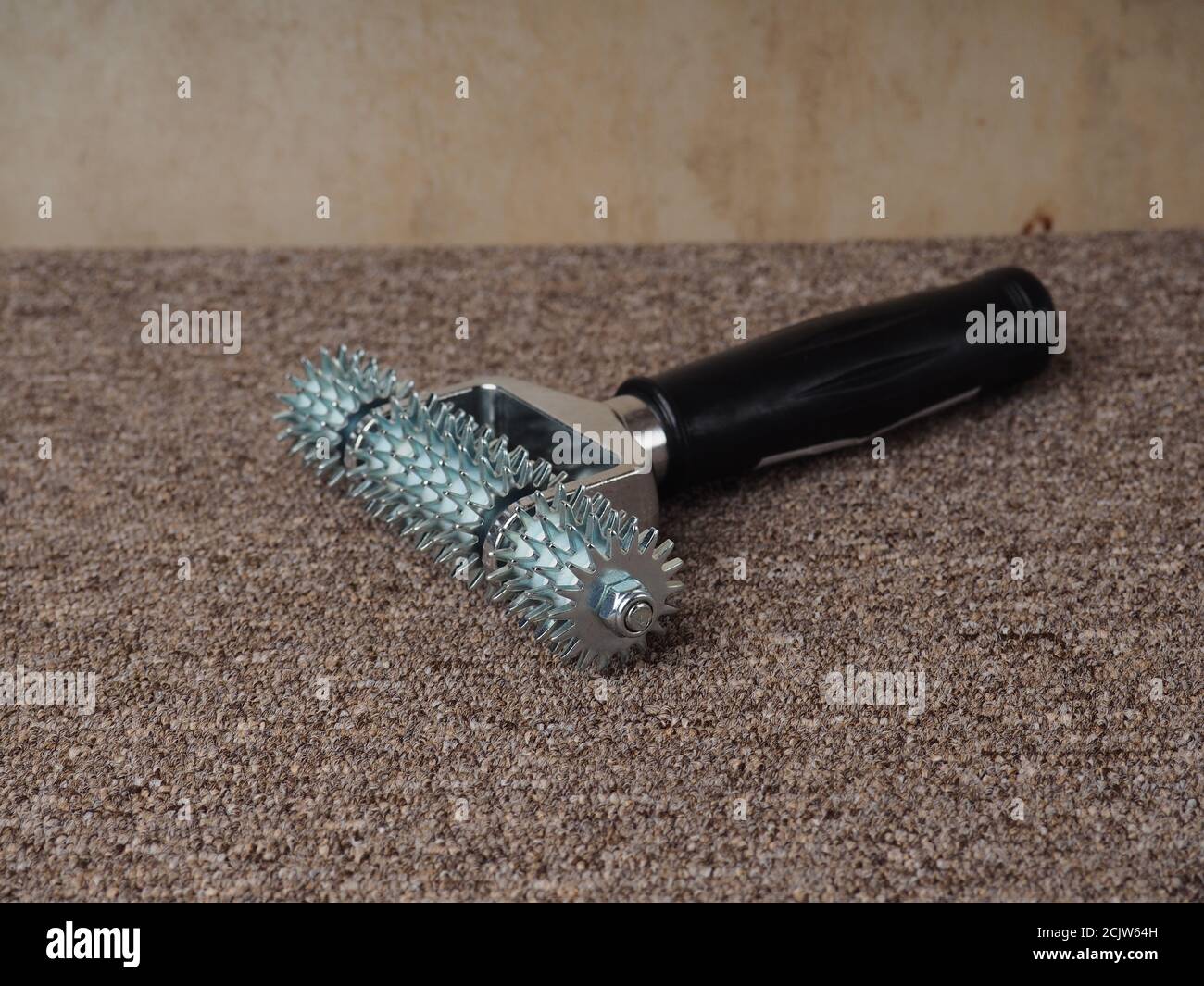 carpet installation tool. comb and trim carpet, tool isolated Stock