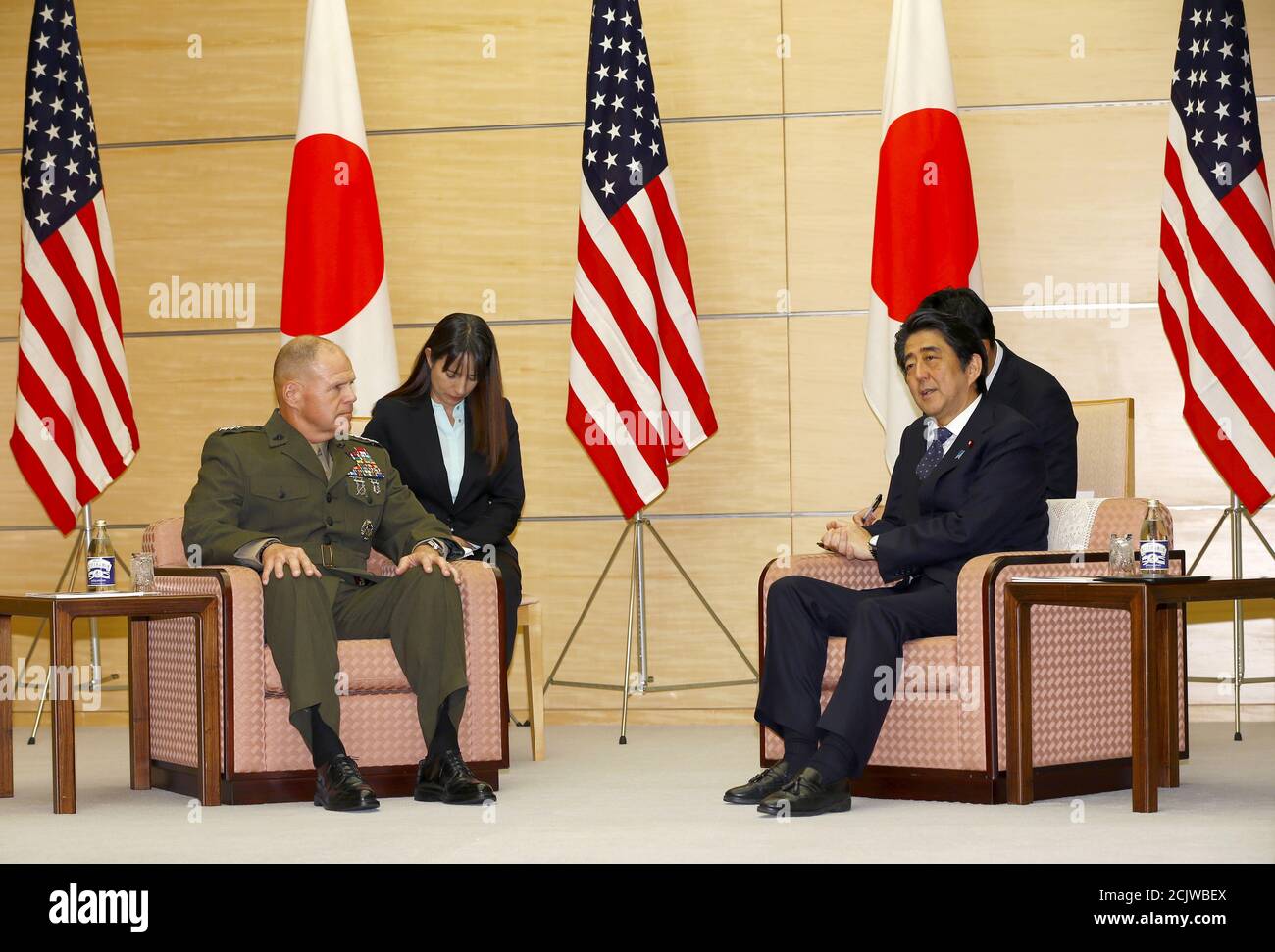 Gen. Robert B. Neller, U.S. Commandant of the Marine Corps, talks with Japanese Prime Minister Shinzo Ab at Abe's official residence in Tokyo, Wednesday, Nov. 25, 2015. REUTERS/Shizuo Kambayashi/Pool Stock Photo