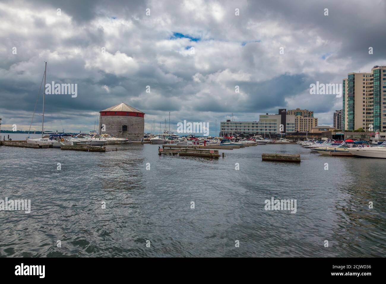 Kingston, Ontario, Canada, August 2014 - The marina and historic stone Martello tower at the waterfront in Kingston Stock Photo