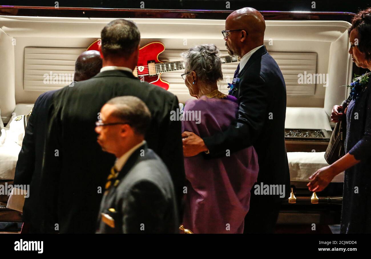 Themetta "Toddy" Suggs (C) bids farewell to her husband Chuck Berry at his  funeral at The
