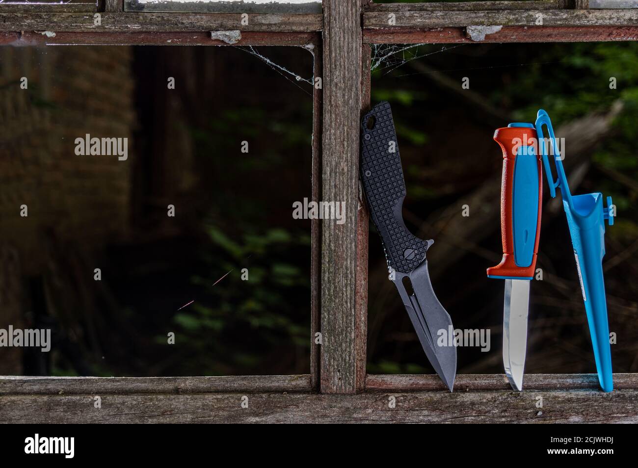 A set of various knives. Folding and fixed knife. Stock Photo