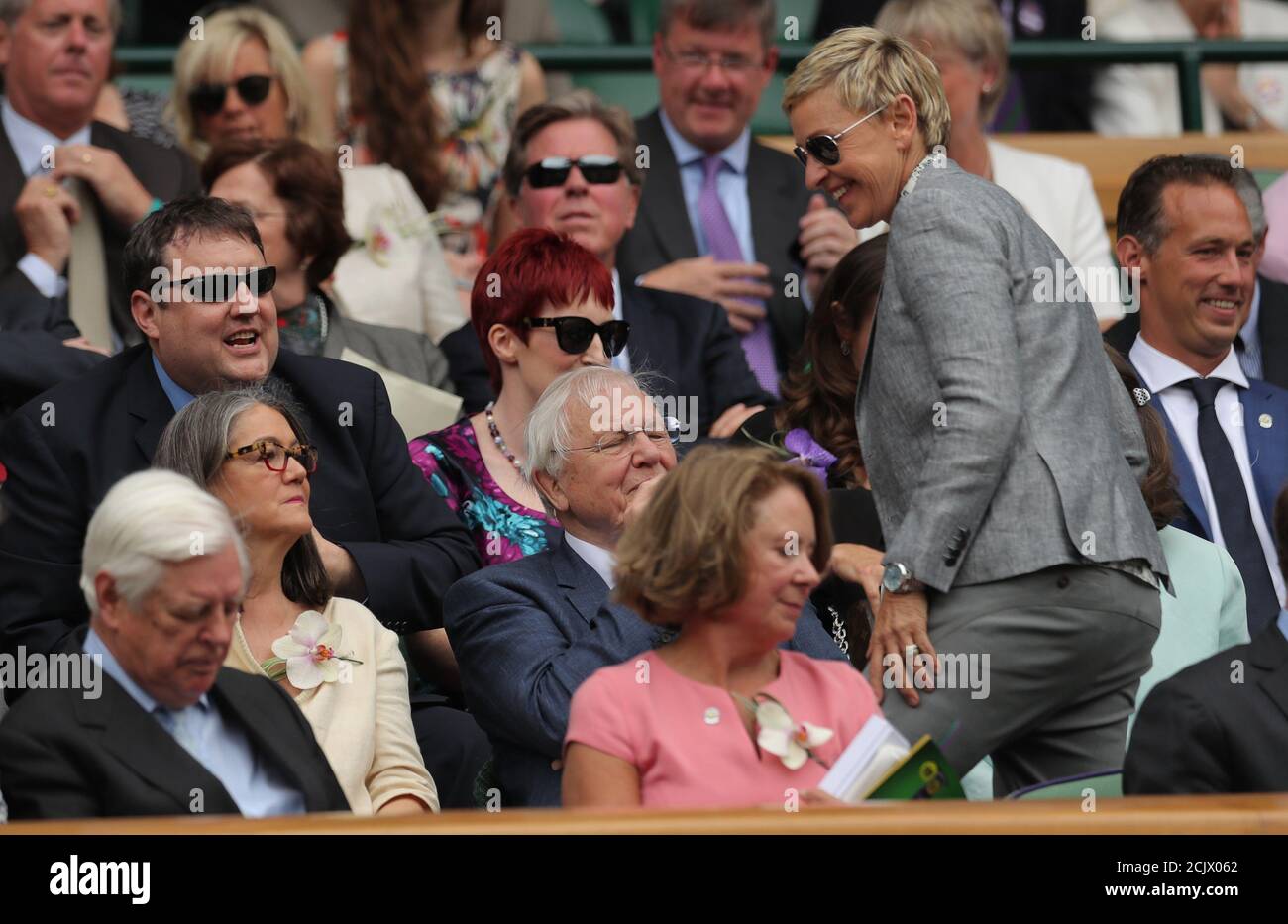 Britain Tennis - Wimbledon - All England Lawn Tennis & Croquet Club,  Wimbledon, England - 9/7/16 Comedian Peter Kay and TV presenter Ellen  DeGeneres in the royal box on centre court before