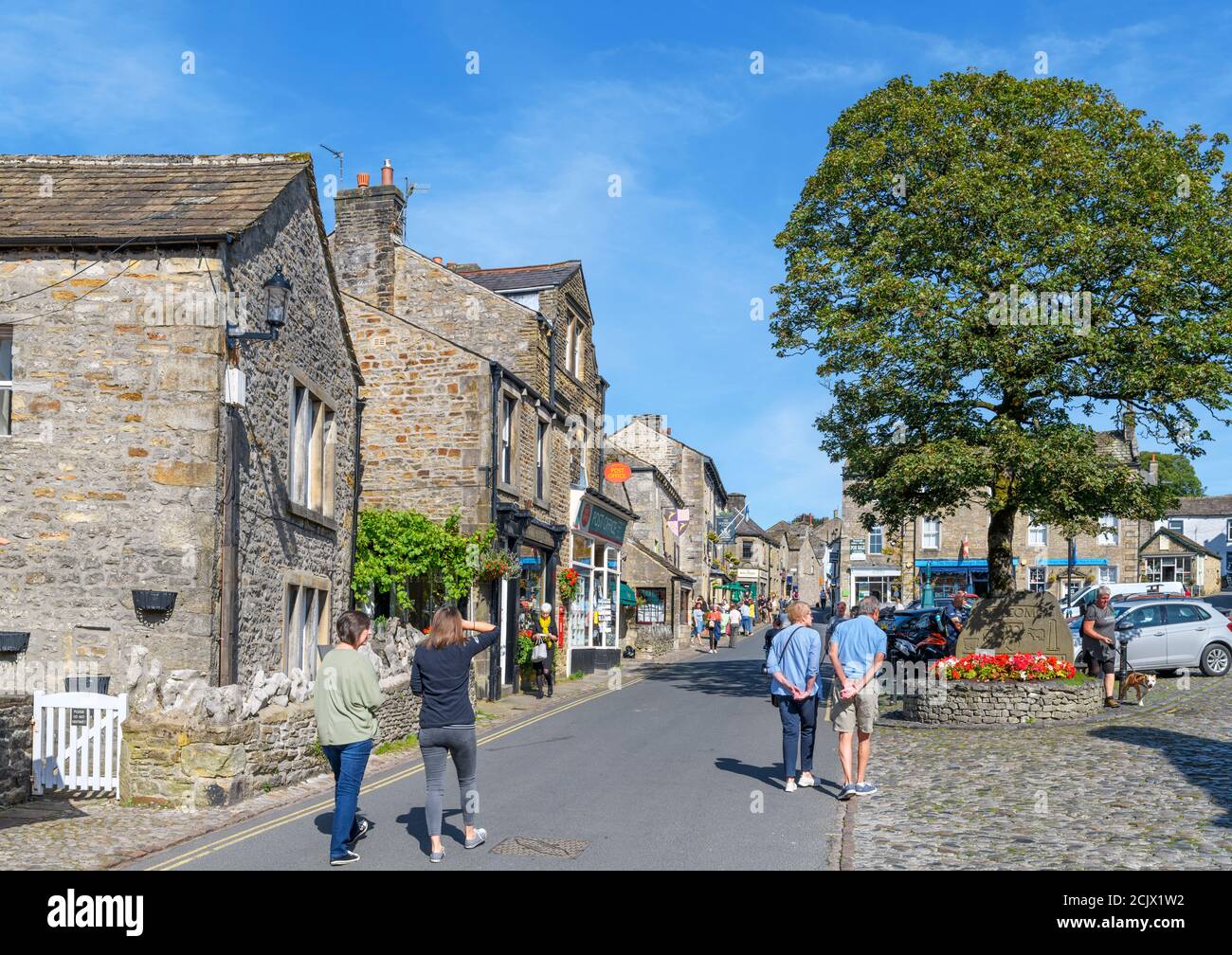 The Square and Main Street in the  traditional English village of Grassington, Yorkshire Dales National Park, North Yorkshire, England, UK. Stock Photo
