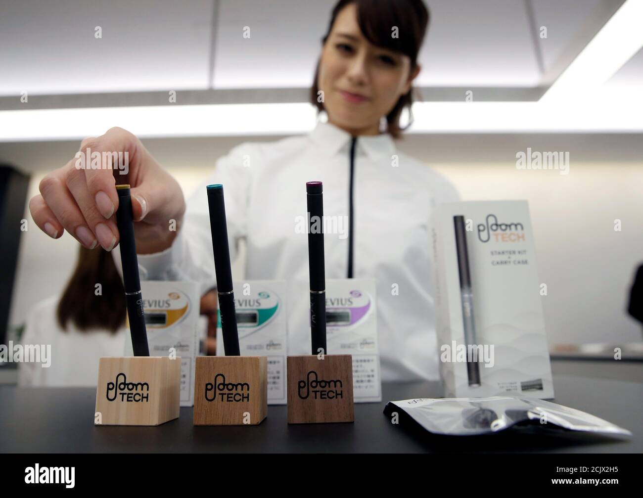 A Shop Assistant Poses With Japan Tobacco Inc S Ploom Tech Smokeless Vaping Products At Its Ploom Shop In Tokyo Japan June 28 17 Reuters Toru Hanai Stock Photo Alamy A Shop Assistant Poses With Japan Tobacco Inc S Ploom Tech Smokeless Vaping Products At Its Ploom Shop In Tokyo Japan June 28 17 Reuters Toru Hanai Stock Photo Alamy
