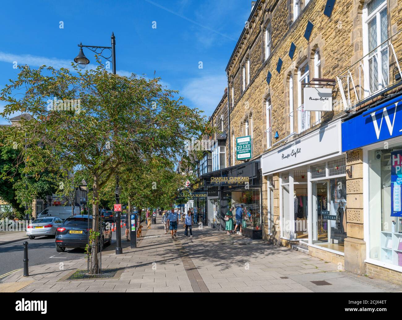 Shops on The Grove, the main street in Ilkley, North Yorkshire, England, UK. Stock Photo