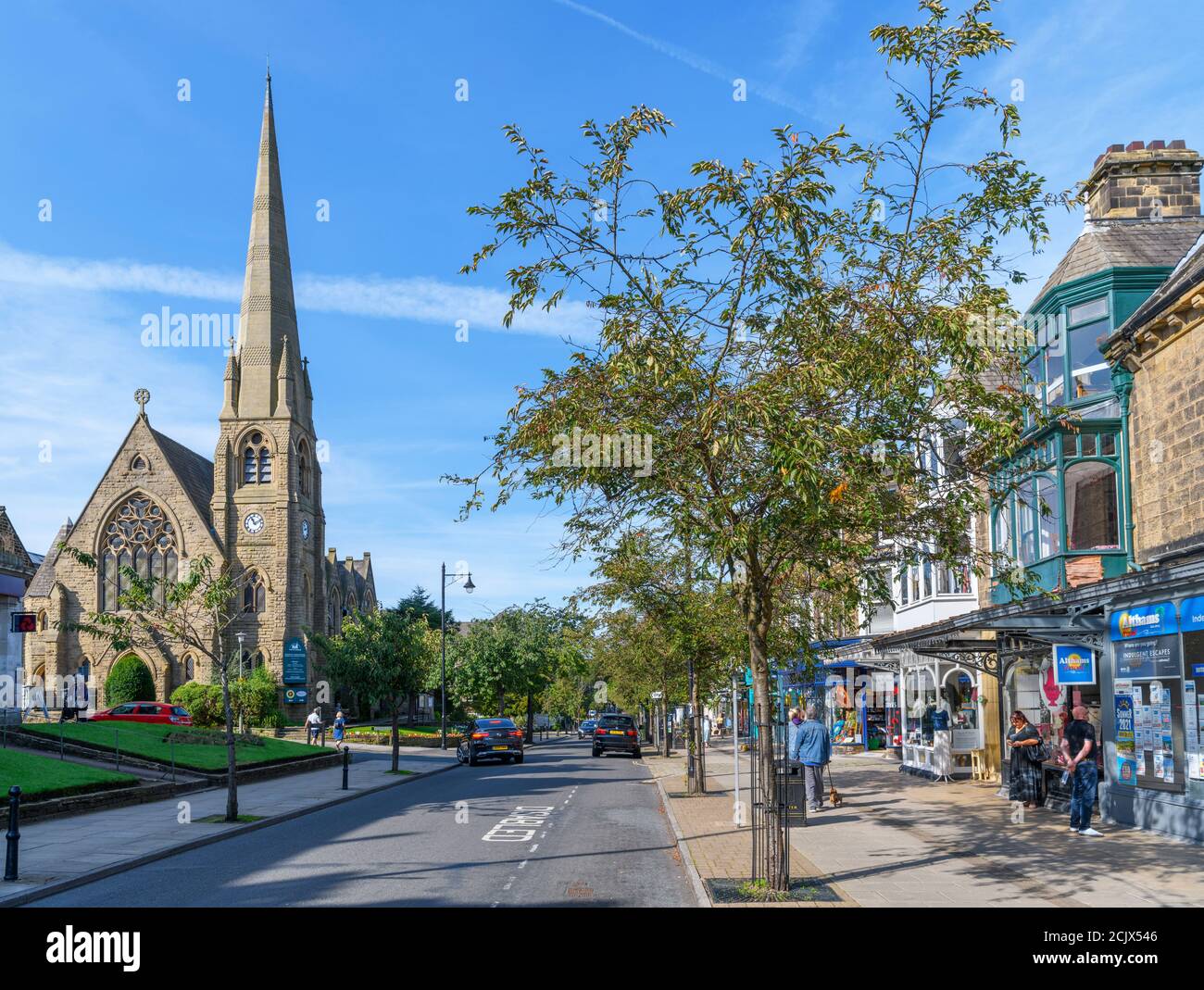Christchurch church and shops on The Grove, the main street in Ilkley, North Yorkshire, England, UK. Stock Photo