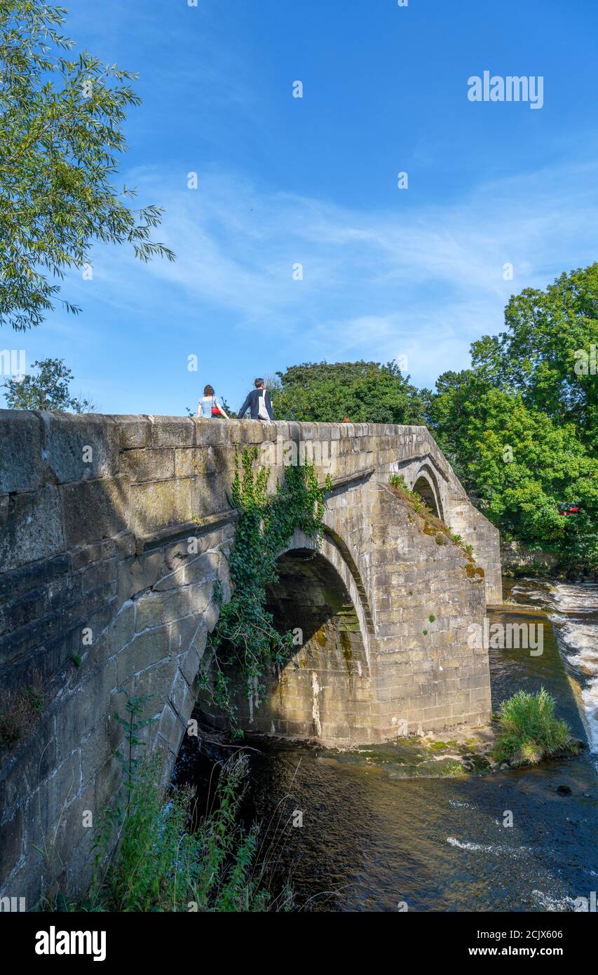 Bridge over the River Wharfe at the start of the Dales Way, Ilkley, North Yorkshire, England, UK. Stock Photo