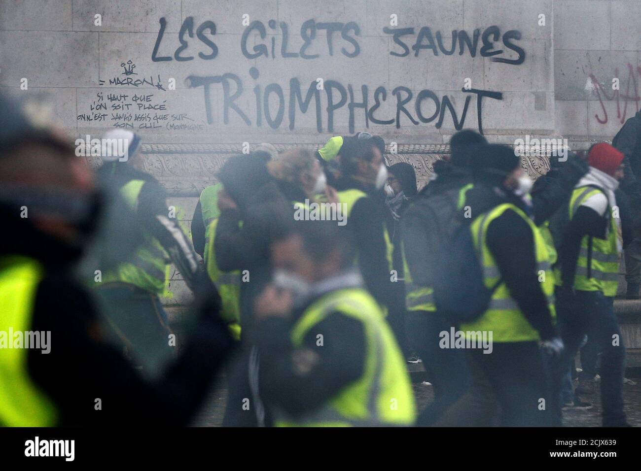 The slogan "The yellow vests will triumph" is seen on the Arc de Triomphe  as protesters wearing yellow vests, a symbol of a drivers' protest against  higher diesel taxes, demonstrate at the