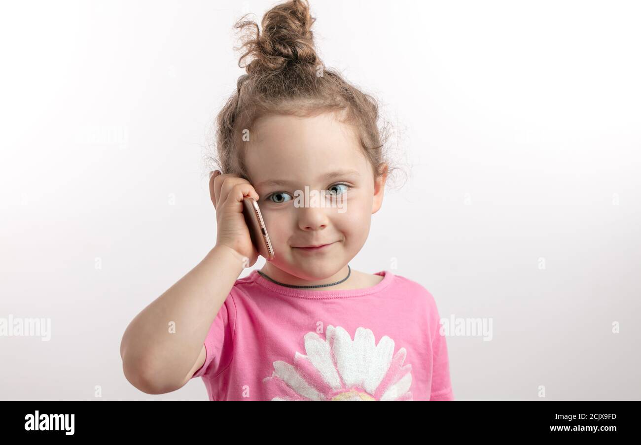 Portrait Of Pretty Baby Talking On Mobile Phone. Isolated Over White Stock  Photo, Picture and Royalty Free Image. Image 4210737.