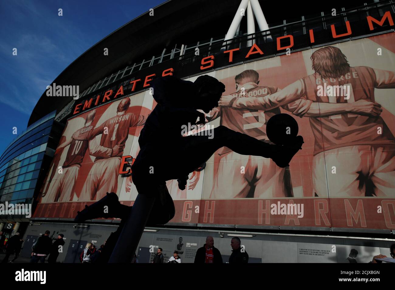 The statue of dennis bergkamp outside the emirates stadium hires stock