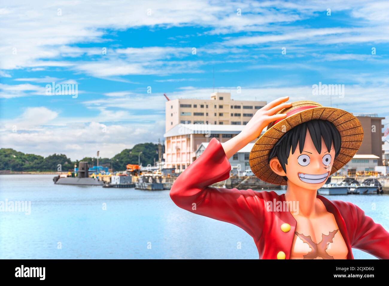 yokosuka, japan - july 19 2020: Close-up on the bust of the real size figurine of the hero Monkey D. Luffy from the manga One Piece by Eiichiro Oda on Stock Photo