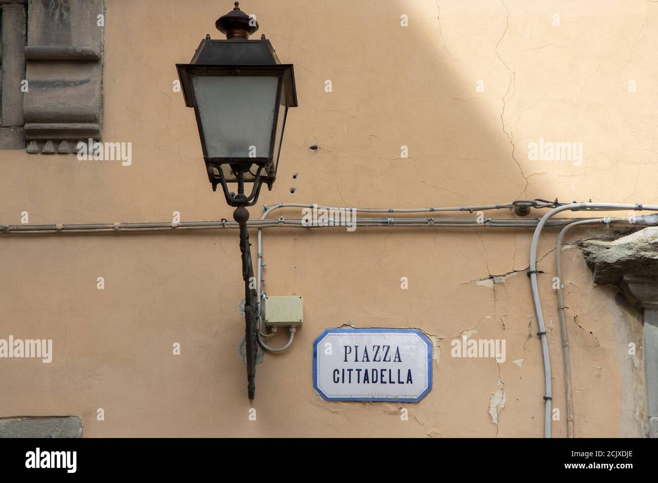 Piazza Cittadella street sign and Lantern in Lucca, Tuscany, Italy, Europe. Stock Photo