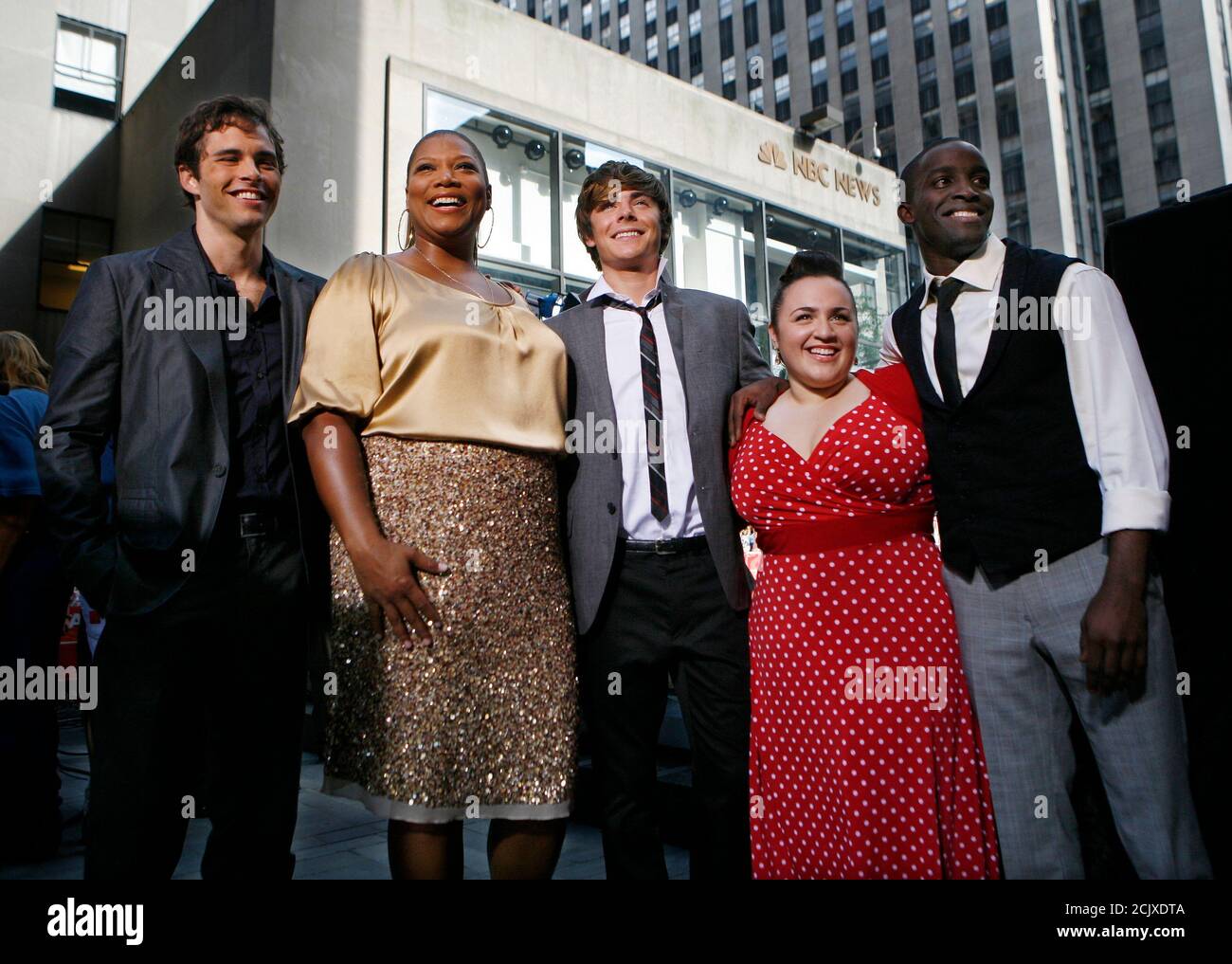 Cast members (L to R) James Marsden, Queen Latifa,  Zac Efron, Nikki Blonsky and Elijah Kelley of the new movie 'Hairspray' pose together during an appearance on NBC's 'Today' show in New York, July 20, 2007.     REUTERS/Brendan McDermid (UNITED STATES) Stock Photo