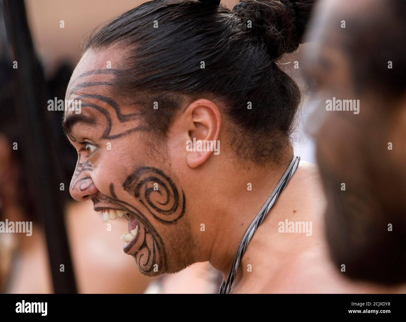 Members of traditional Maori group 'Waka Huia' perform in San Marco square, as part of the opening of the New Zealand pavilion at the Venice Biennale June 3, 2009. The Biennale, one of the world's major art festivals traditionally held every two years dating back to 1895, is open to the public June 7 - November 22, 2009. REUTERS/Tony Gentile  (ITALY SOCIETY) Stock Photo