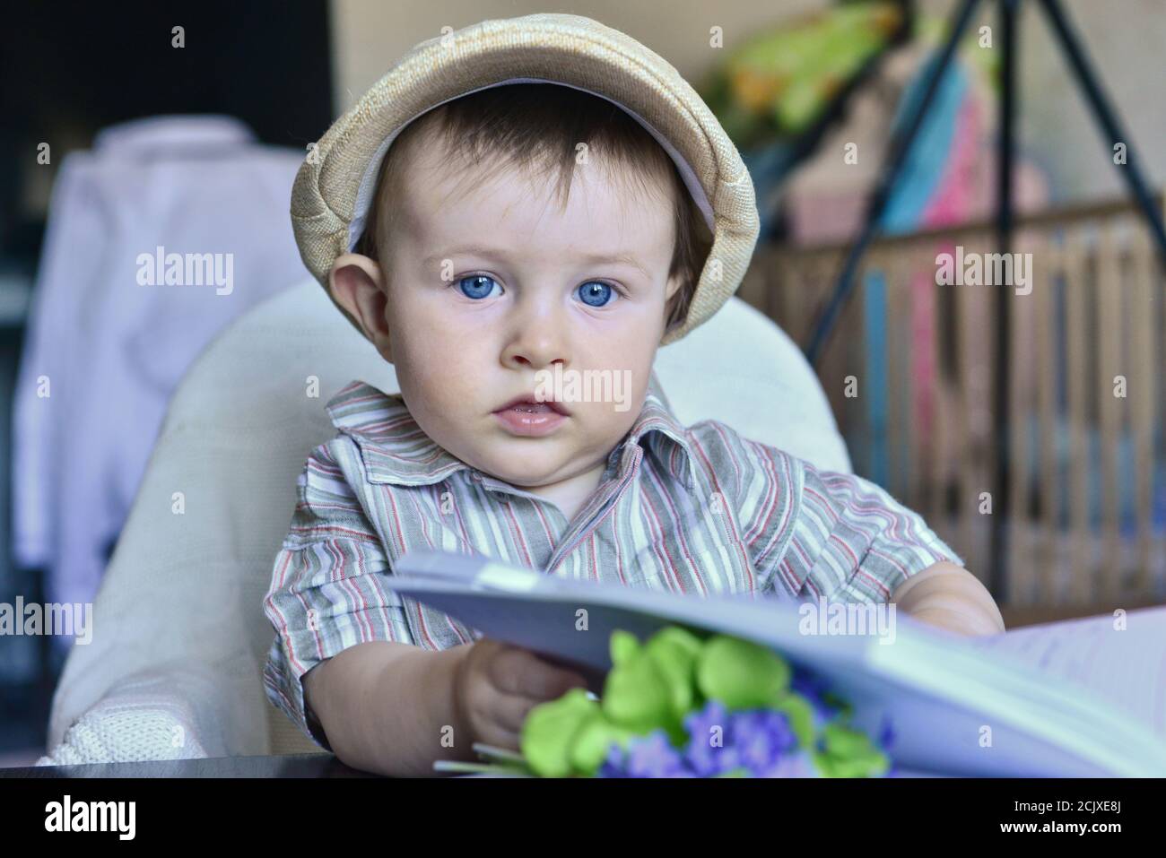 little boy is reading a book. Learning and learning science Stock Photo