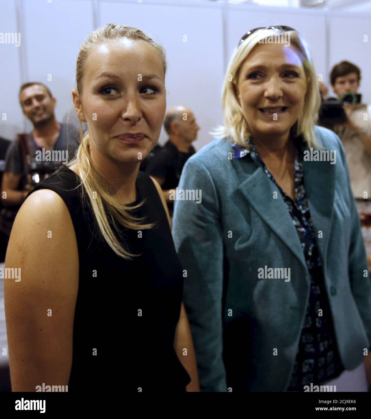 Marine Le Pen (R), leader of France's National Front political party, and  her niece Marion Marechal-Le Pen, deputy of Vaucluse, attend the National  Front political party summer university in Marseille, France, September