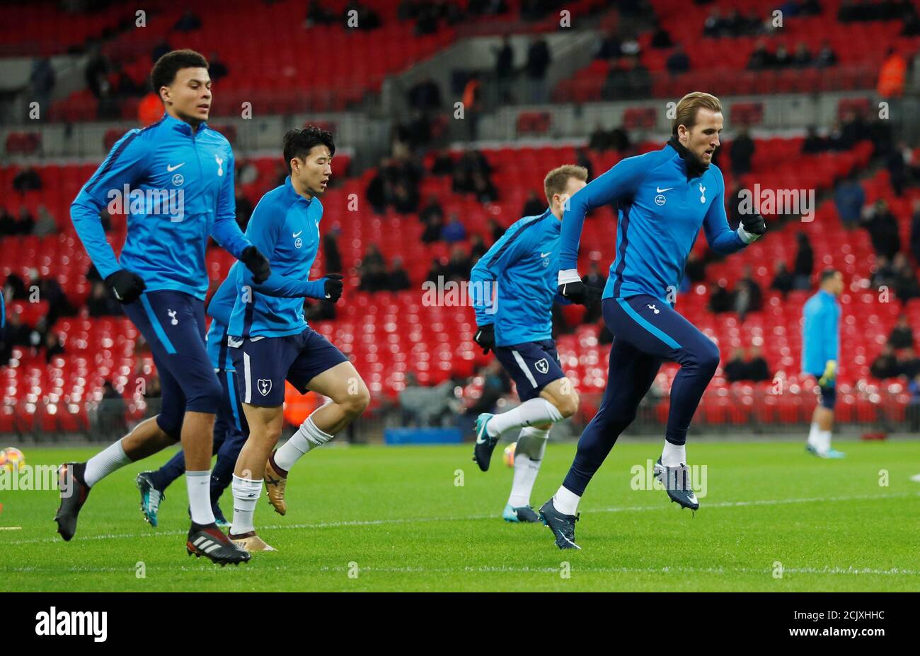 Soccer Football - Premier League - Tottenham Hotspur vs West Ham United - Wembley Stadium, London, Britain - January 4, 2018   Tottenham's Harry Kane, Son Heung-min and Dele Alli warm up before the match   REUTERS/Eddie Keogh    EDITORIAL USE ONLY. No use with unauthorized audio, video, data, fixture lists, club/league logos or 'live' services. Online in-match use limited to 75 images, no video emulation. No use in betting, games or single club/league/player publications.  Please contact your account representative for further details. Stock Photo