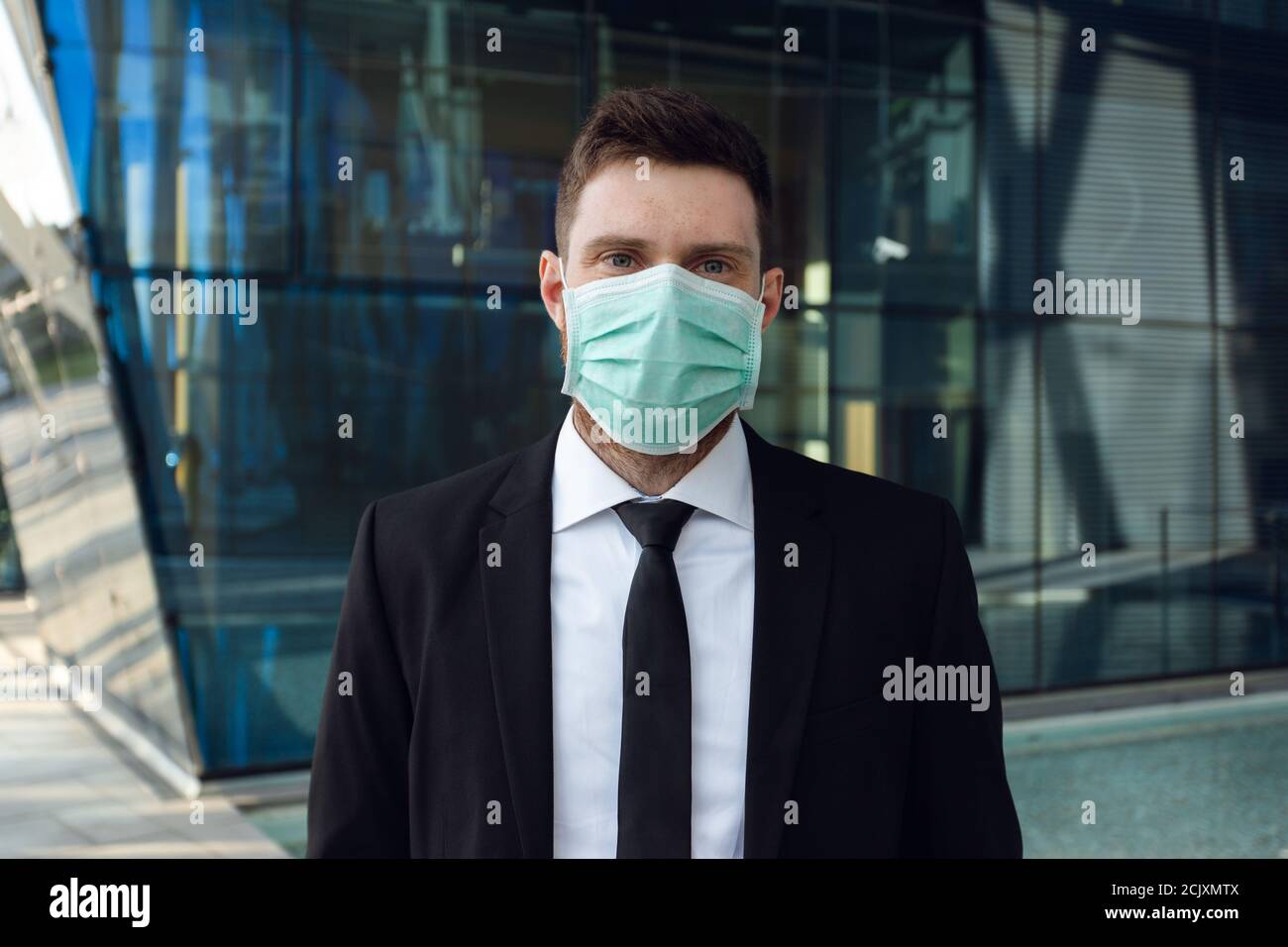 Businessman wearing medical mask hires stock photography and images