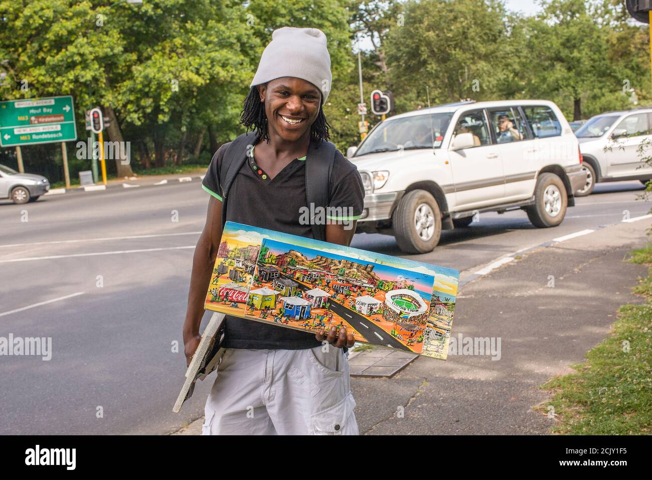 African man selling curios in Cape Town, South Africa Stock Photo