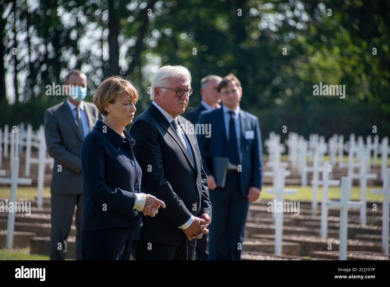 Germany, Saxony-Anhalt, Gardelegen, Federal President Frank-Walter Steinmeier and his wife Elke Büdenbender stand in silent remembrance at the graves of the Isenschnibbe field barn memorial in Gardelegen. On April 13, 1945, over 1000 concentration camp prisoners were driven by the Nazis into a barn that was subsequently set on fire. There were only a few survivors of the massacre. A new documentation center commemorates this crime shortly before the end of the war. Credit: Mattis Kaminer/Alamy Live News Stock Photo