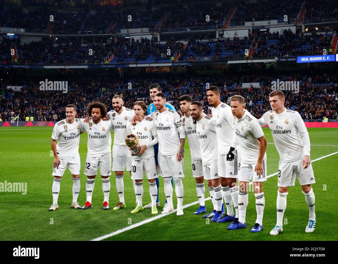 Soccer Football - La Liga Santander - Real Madrid v Rayo Vallecano -  Santiago Bernabeu, Madrid, Spain - December 15, 2018 Real Madrid's Luka  Modric with The Ballon d'Or trophy and team