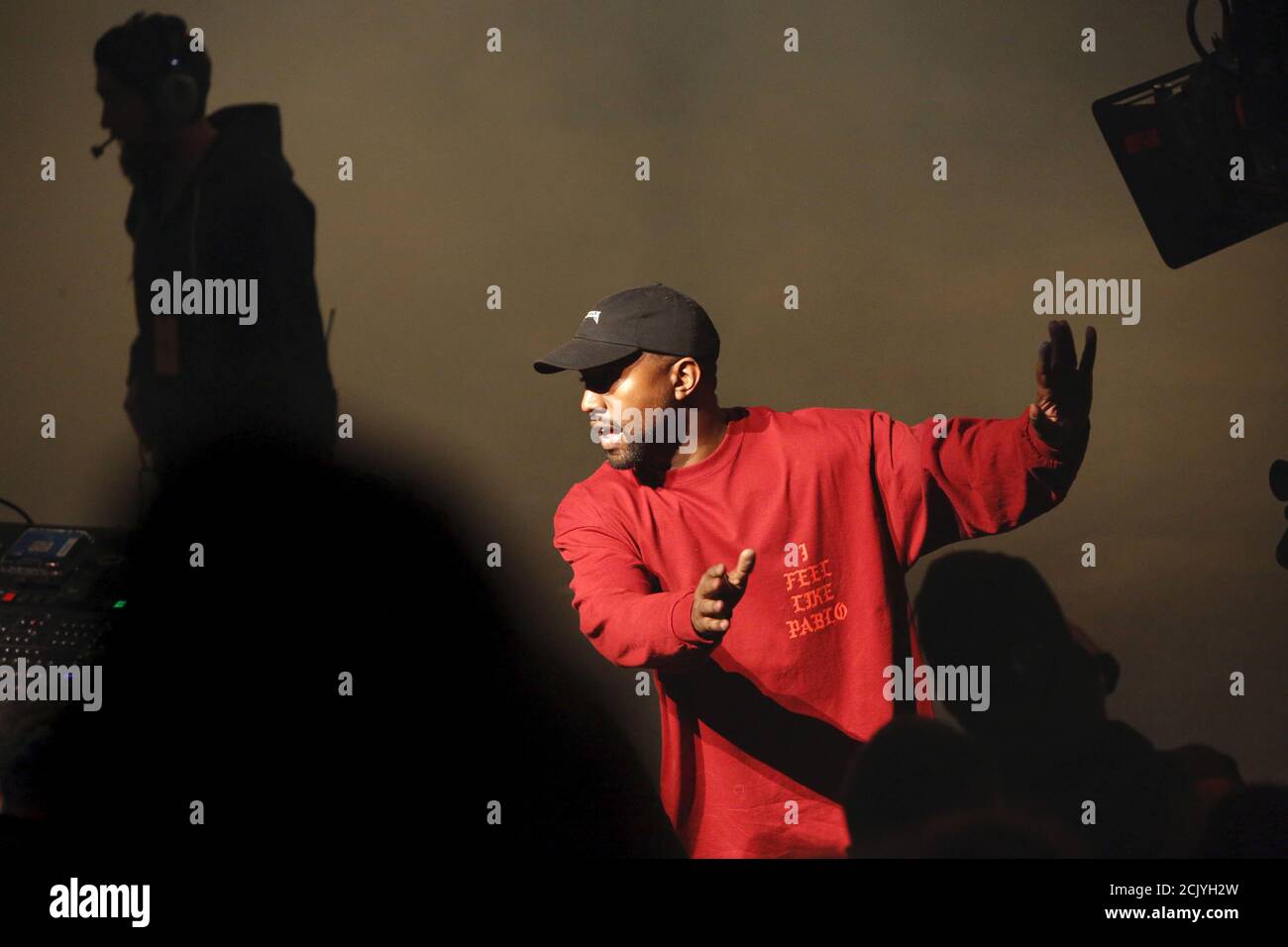 Kanye West directs people during his Yeezy Season 3 Collection presentation  and listening party for the "