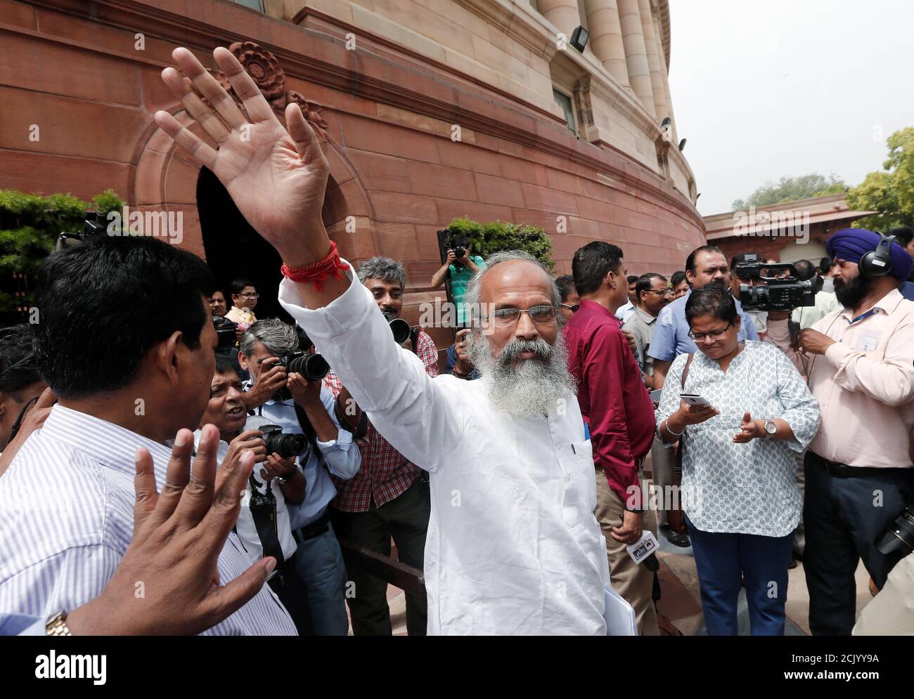 India's Minister of State (MOS) for Ministry of Micro, Small and Medium Enterprises and Animal Husbandry Pratap Chandra Sarangi waves as he arrives to attend the opening day of the Parliament session India's Minister of State (MOS) for Ministry of Micro, Small and Medium Enterprises and Animal Husbandry Pratap Chandra Sarangi waves as he arrives to attend the opening day of the Parliament session